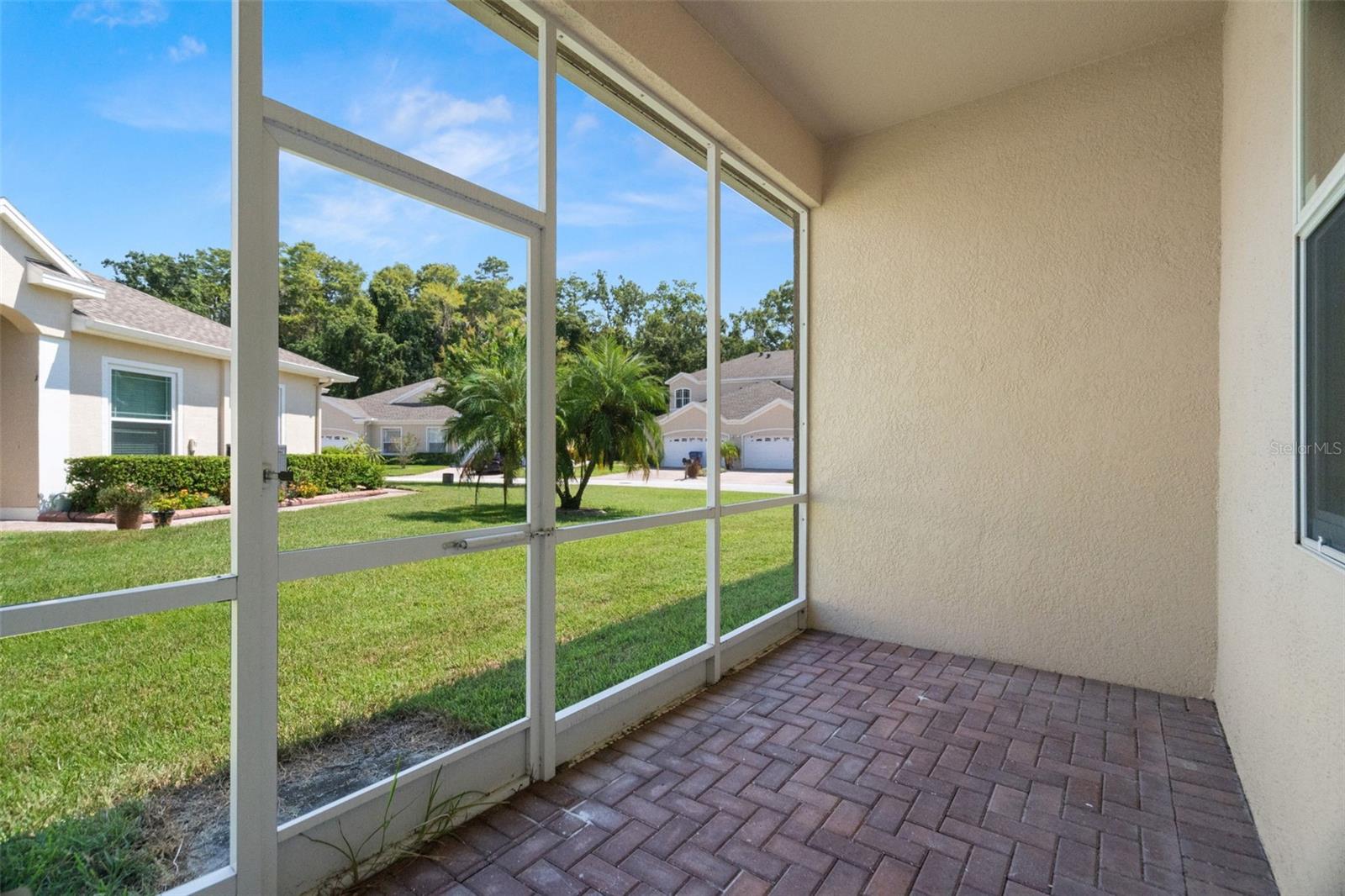 Screened lanai with brick paver flooring