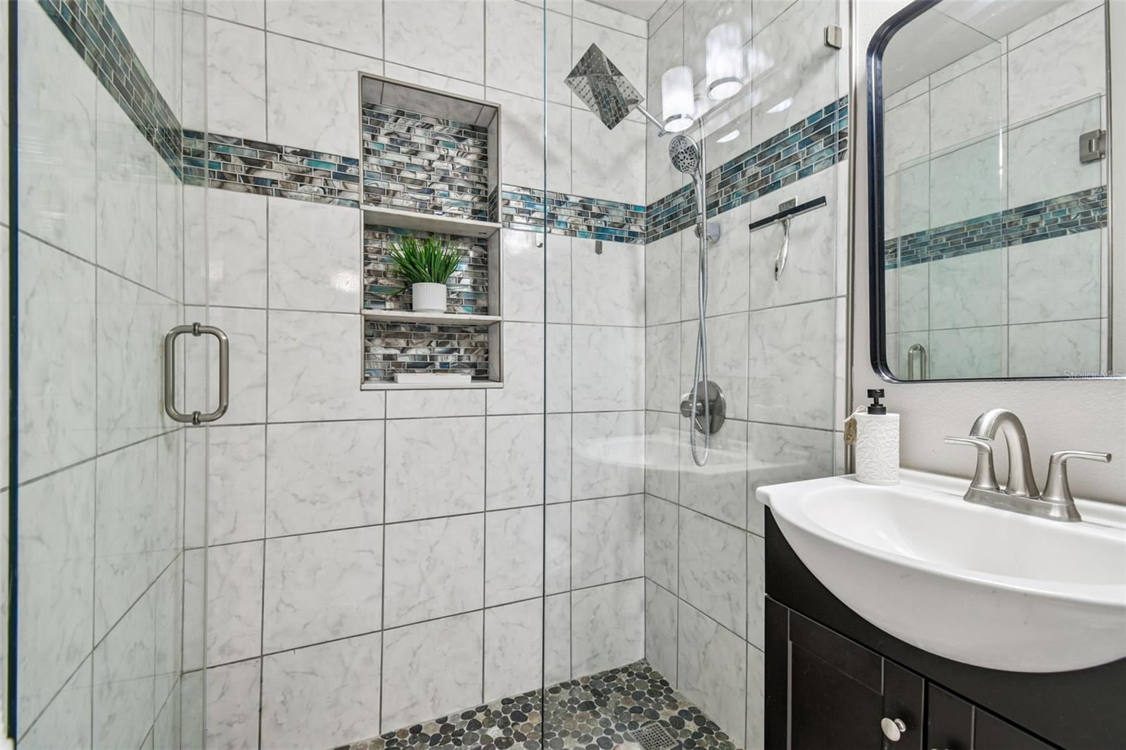 Frameless glass walk in shower