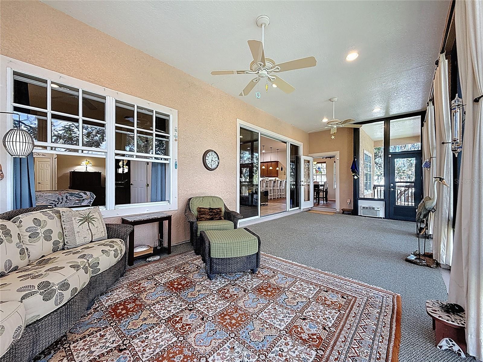 Florida Room - 360 additional square feet with a wall of windows for enjoying the serene atmosphere