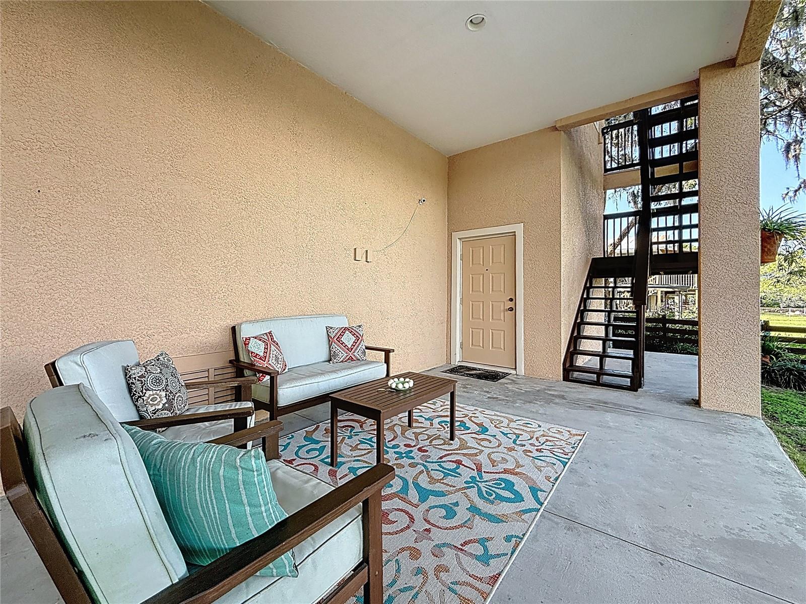 Lower Level Patio - Garage Access - Stairs to Living Level