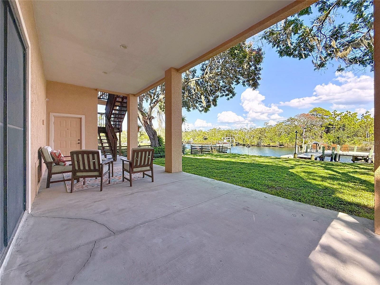 Lower Level Patio - Garage Access - Stairs to Living Level