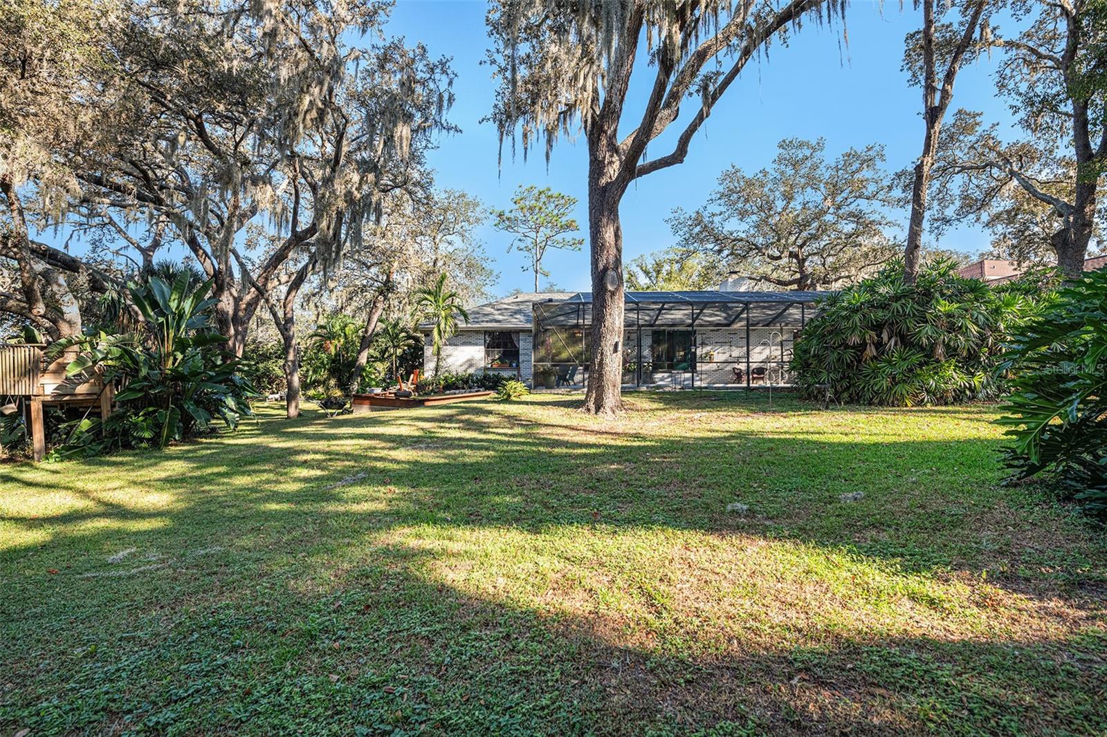 Lush, mature landscaping on almost 1/2 acre lot!