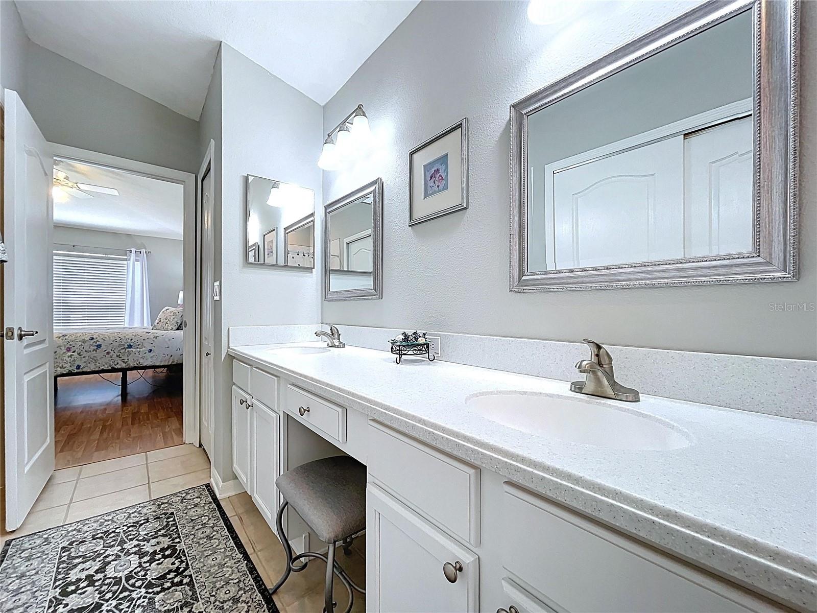 Remodeled master bath with corning counters