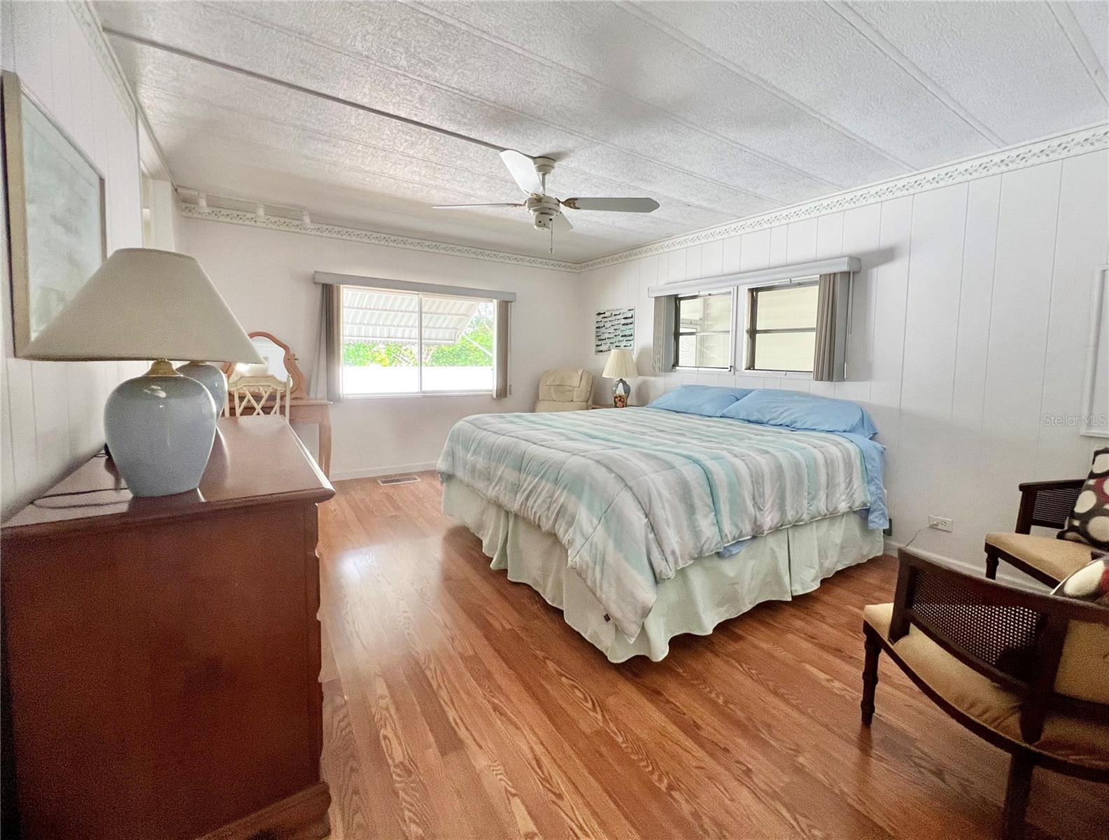 Primary bedroom with walk in closet
