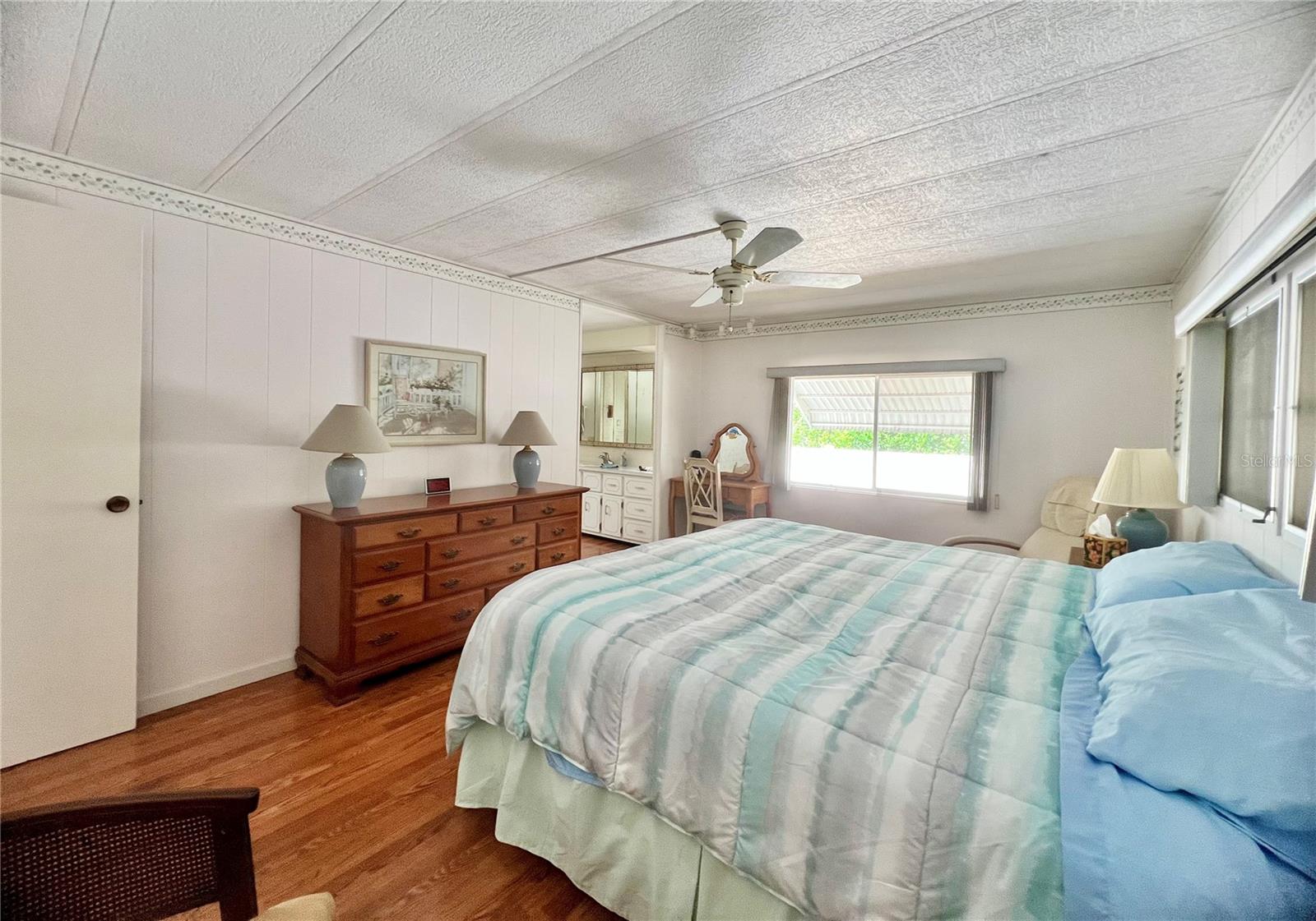 Primary bedroom with walk in closet