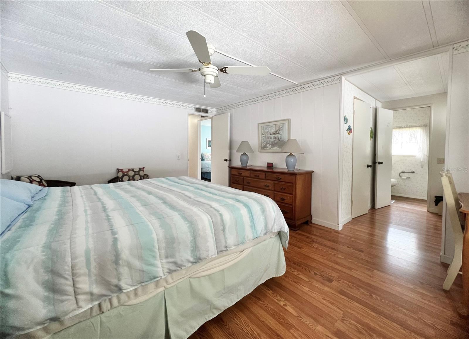 Primary bedroom with walk in closet