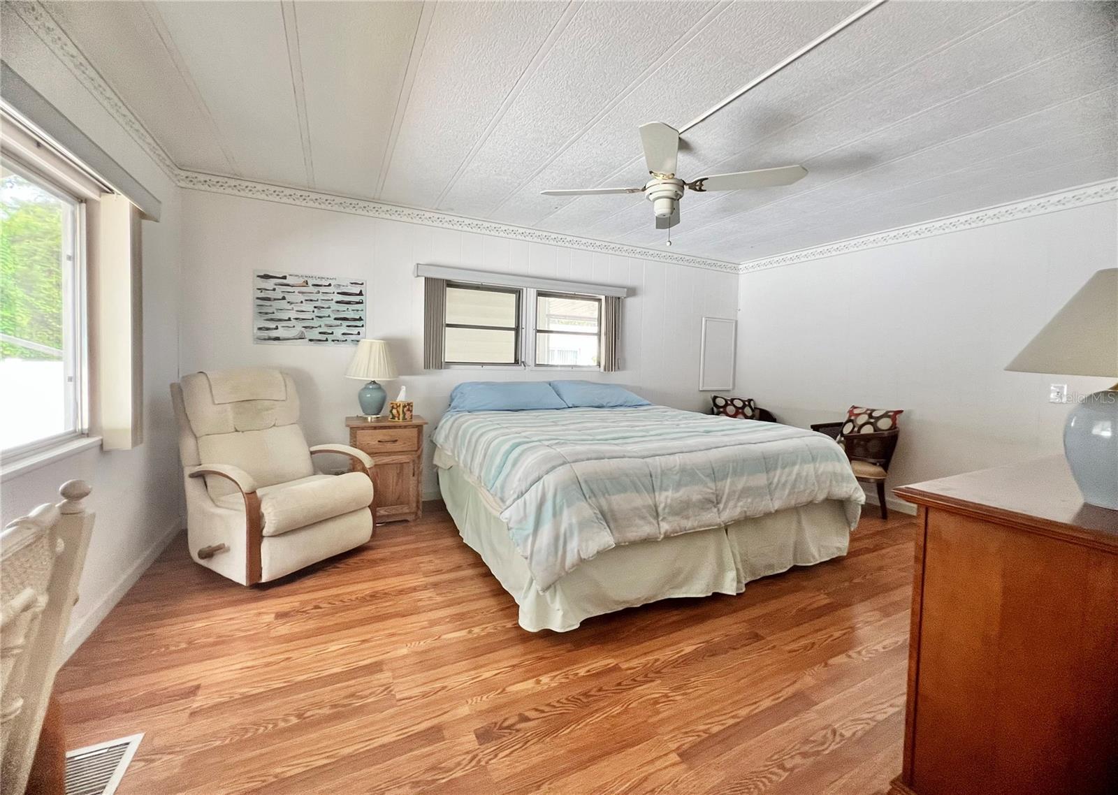 Primary bedroom with walk in closet
