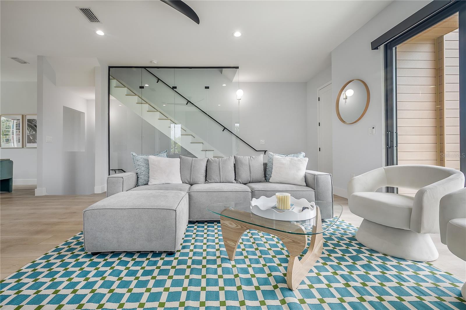 living room, glass wall staircase