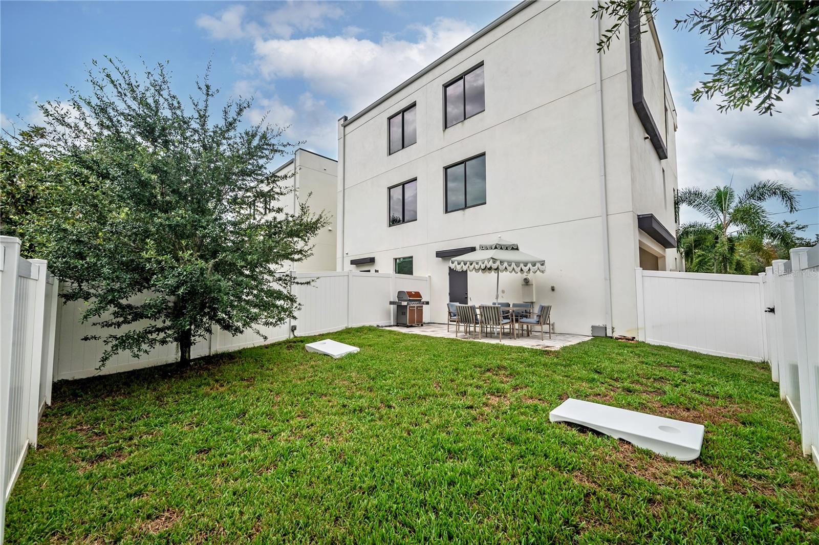 private fenced in backyard/back patio