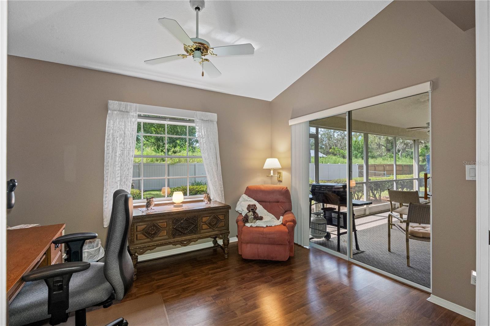 Sitting room is spacious and leads to covered lanai