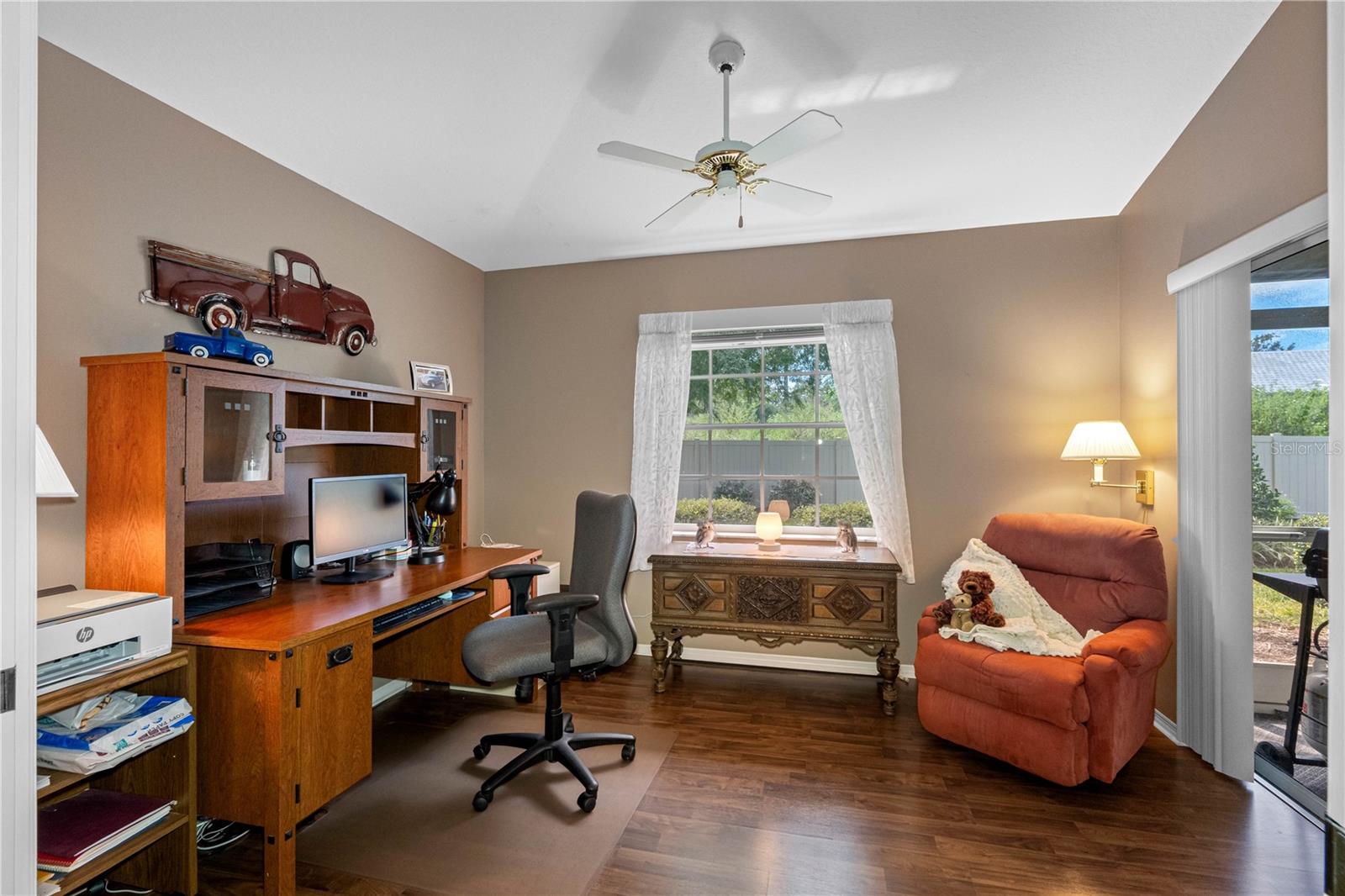 This sitting room/ office can be closed off with the pocket doors.
