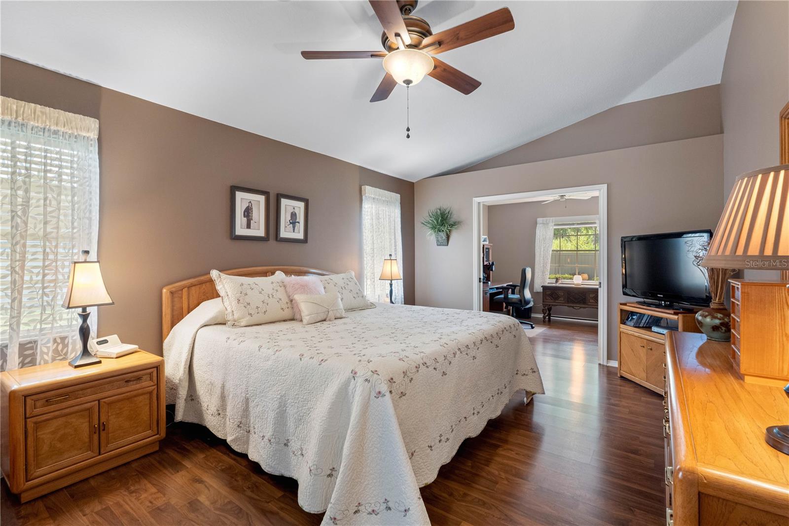 Master retreat with pocket doors to peaceful sitting room/office.