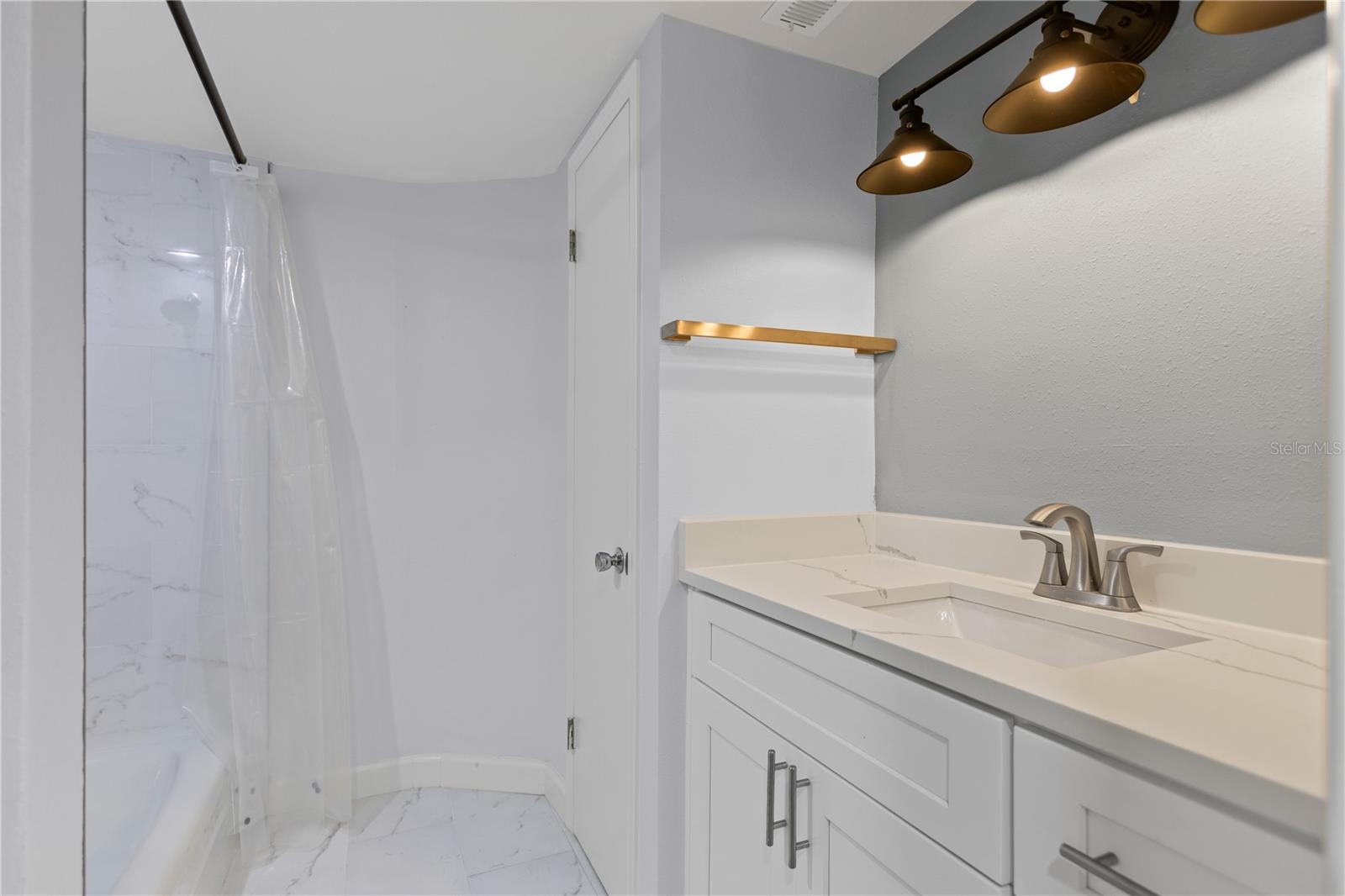 Second full bathroom with tub