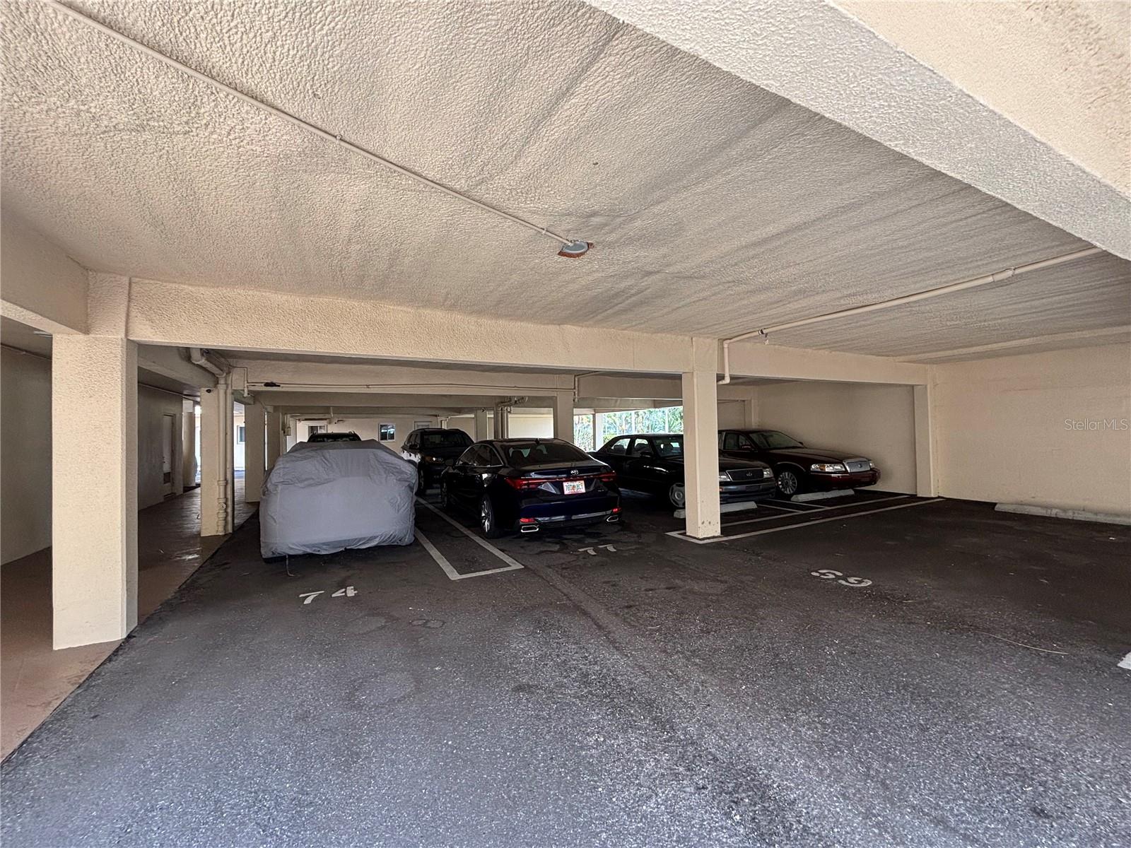 Covered, assigned. parking