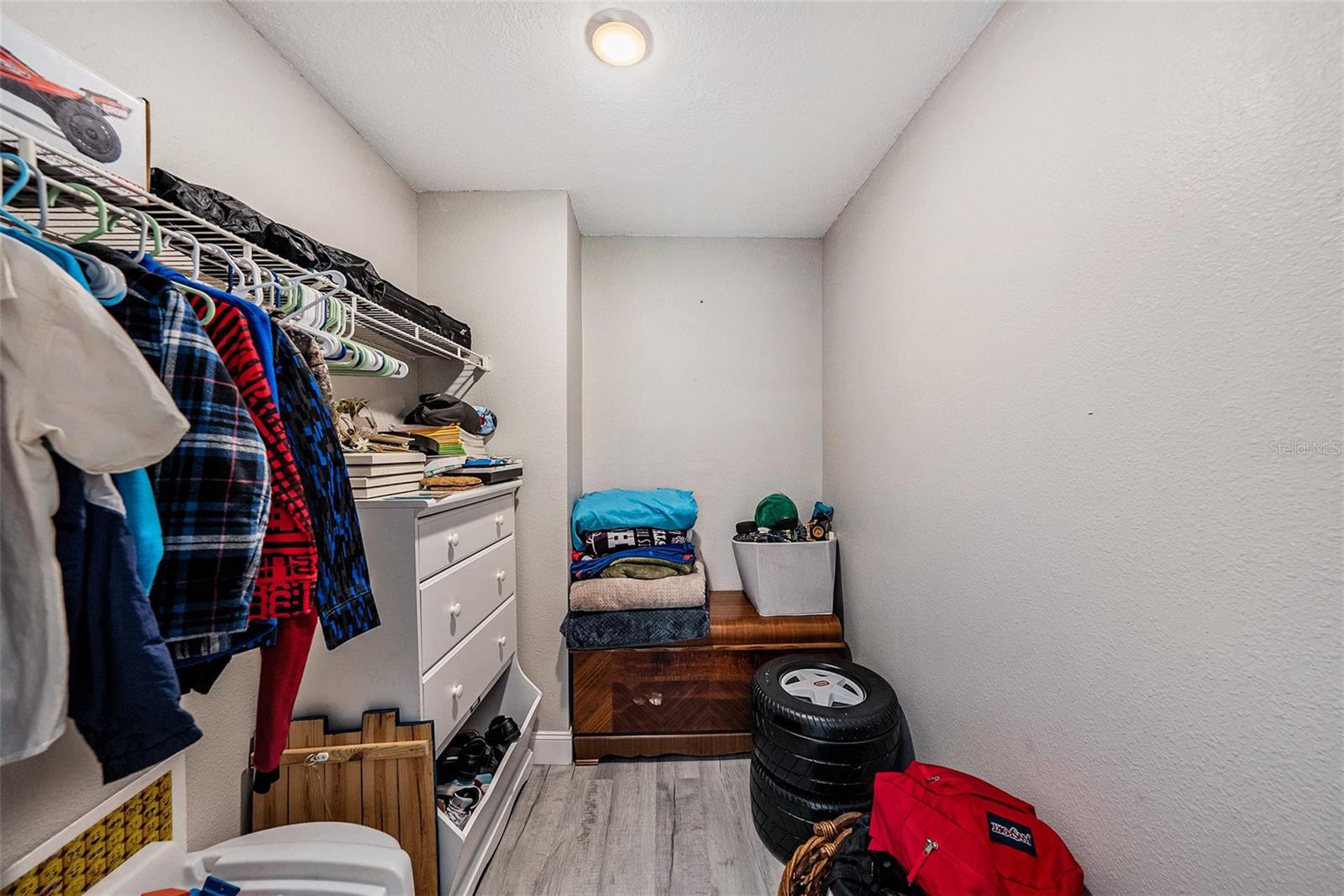 Large walk in closet for secondary bedroom