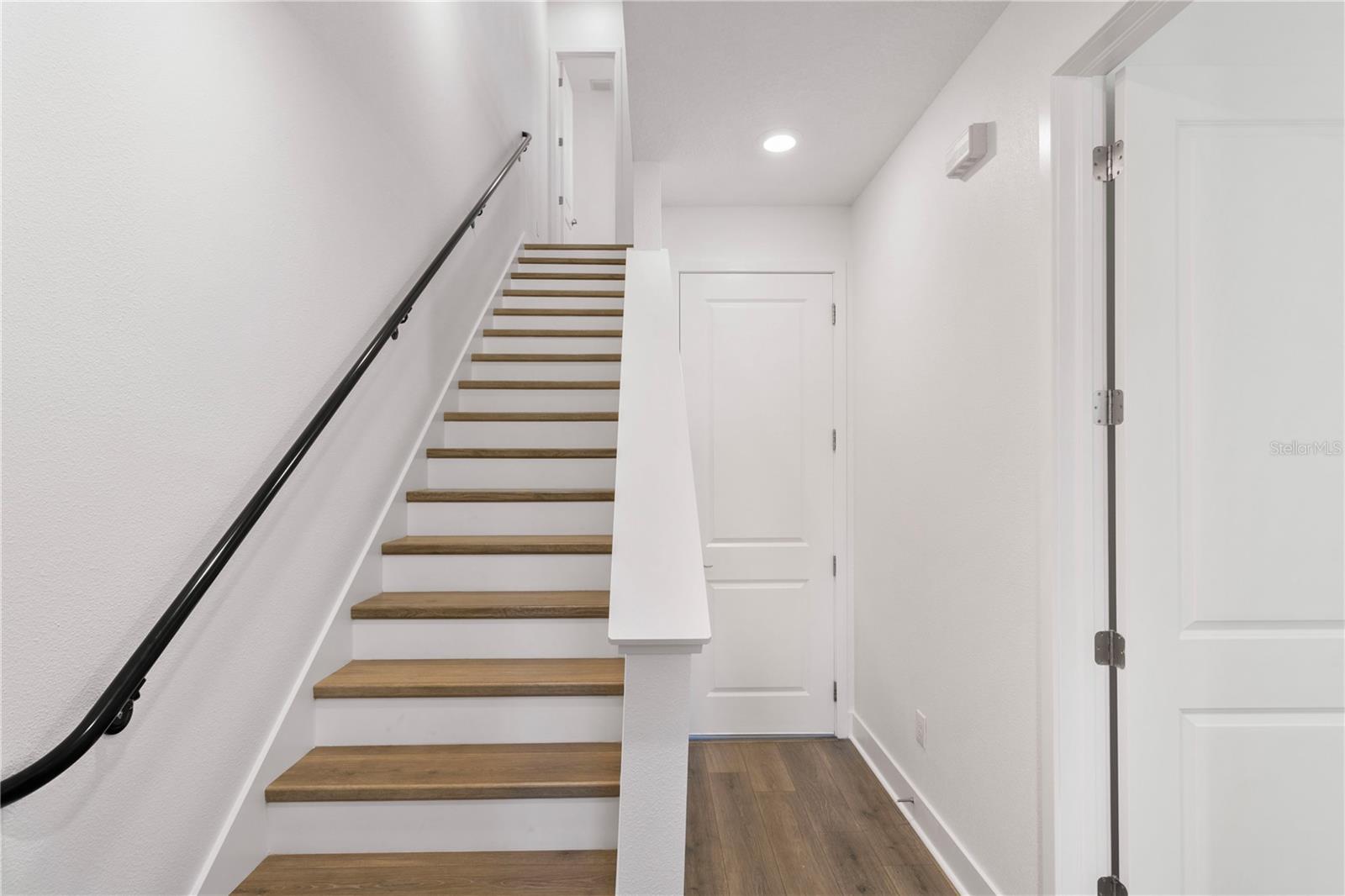 Staircase from front door to 2nd floor