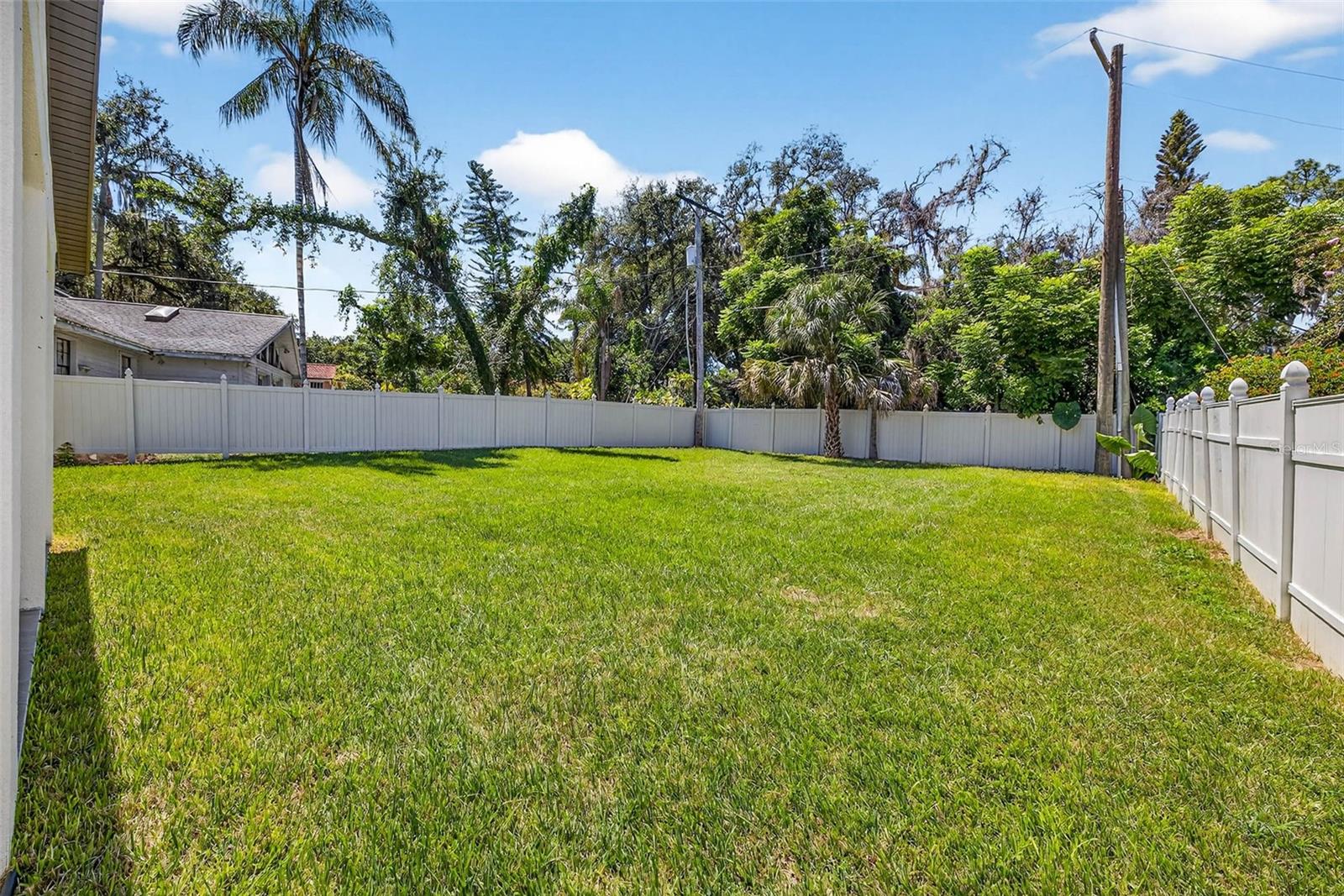 Large fenced in backyard