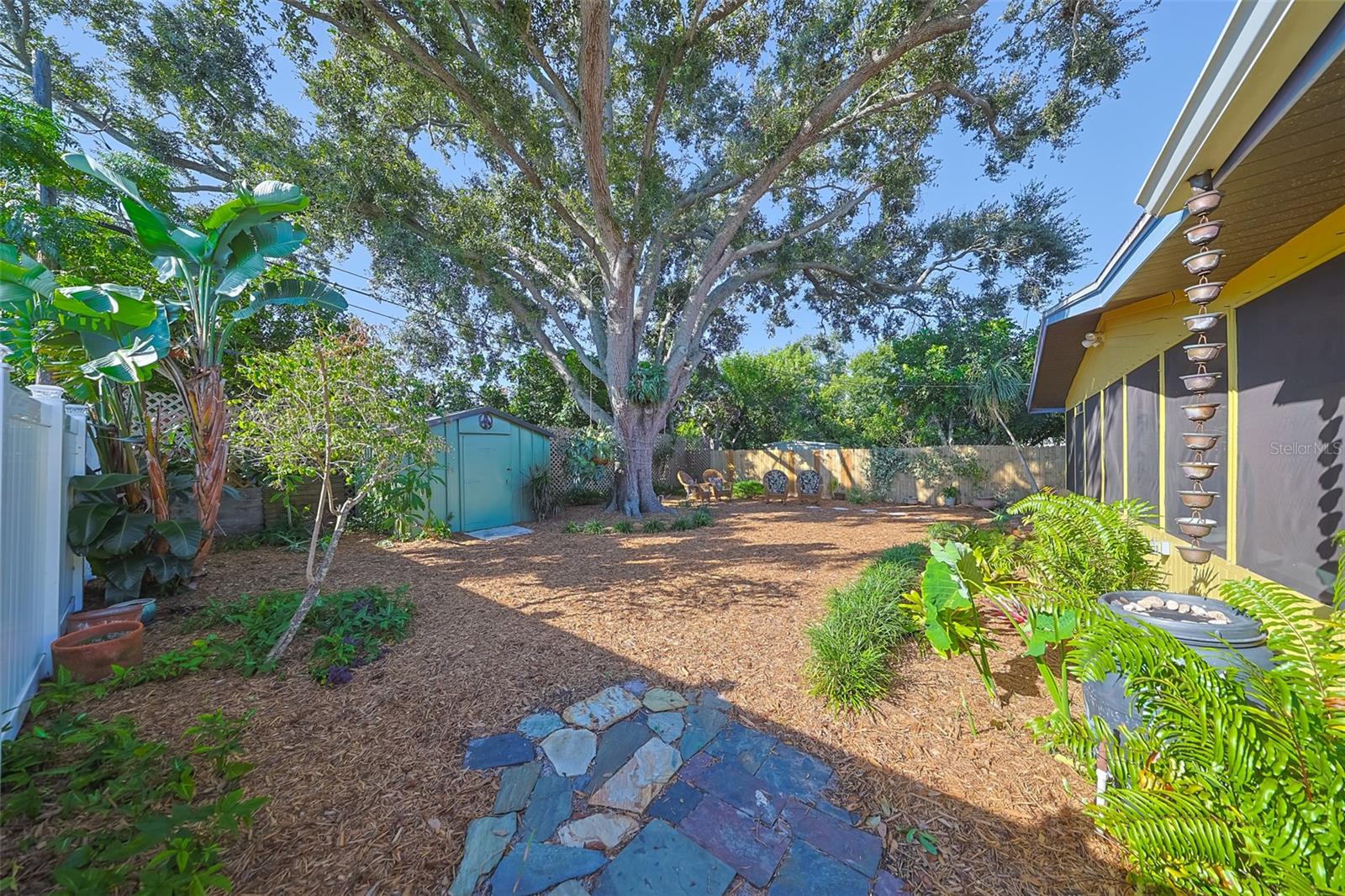 Generous back yard with a shed and xero-scape for an easy care yard.