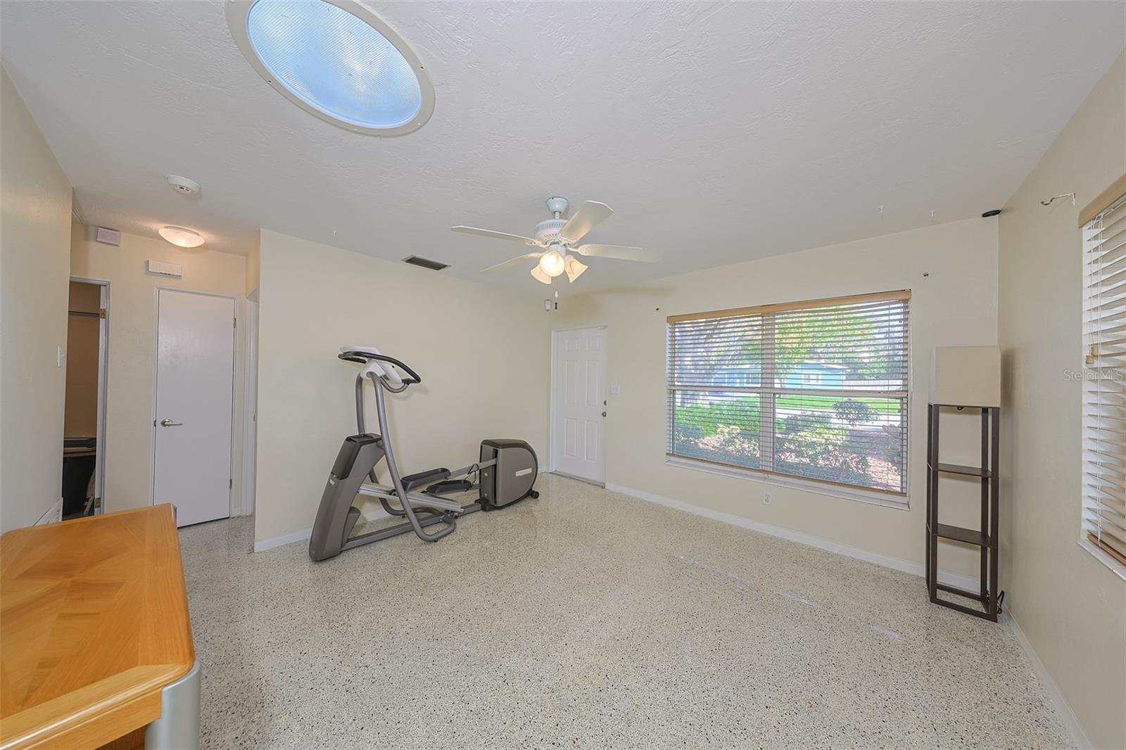 Living room with hall to the 2nd and 3rd bedrooms