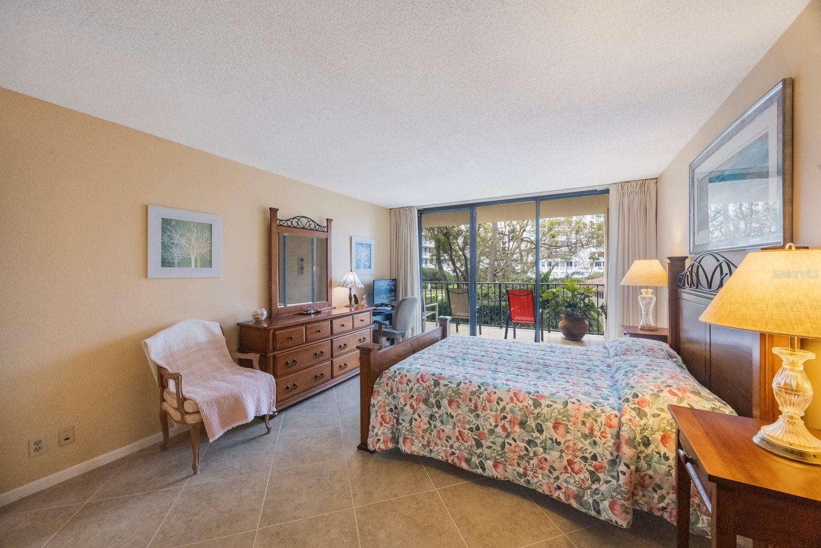 Another view of primary bedroom.