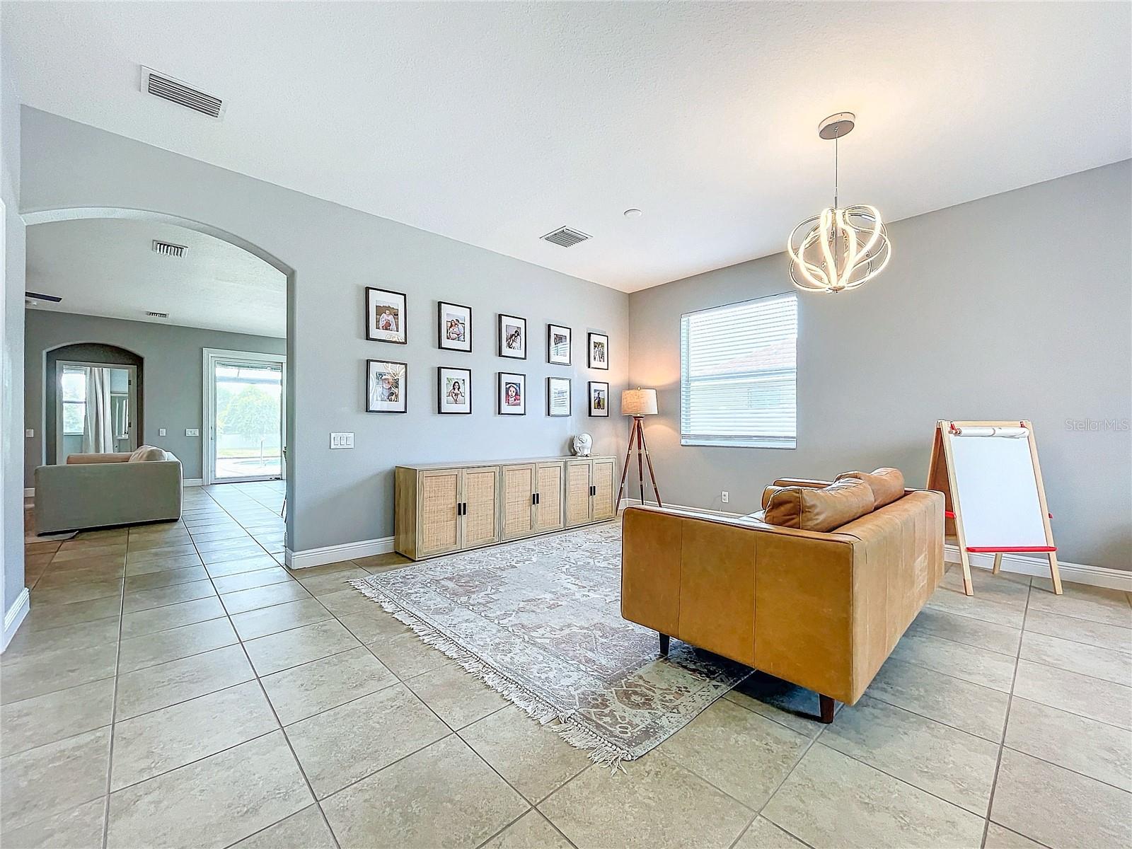 Living room - Shown as it looked when the owner called it home.