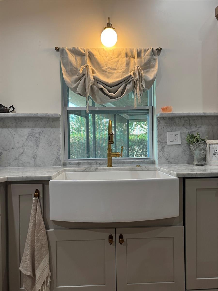 Farm sink below pass through window
