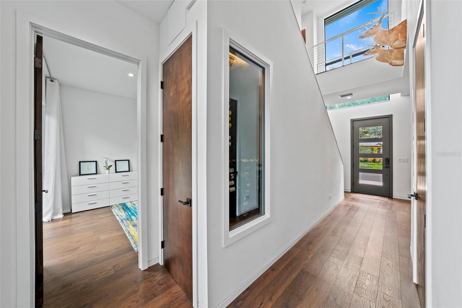 Off the family room is a temperature controlled wine room