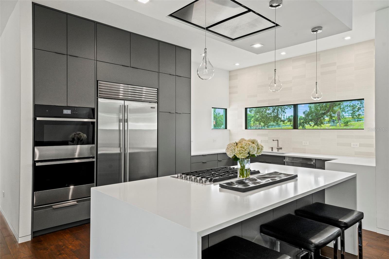 Kitchen is sleek and modern