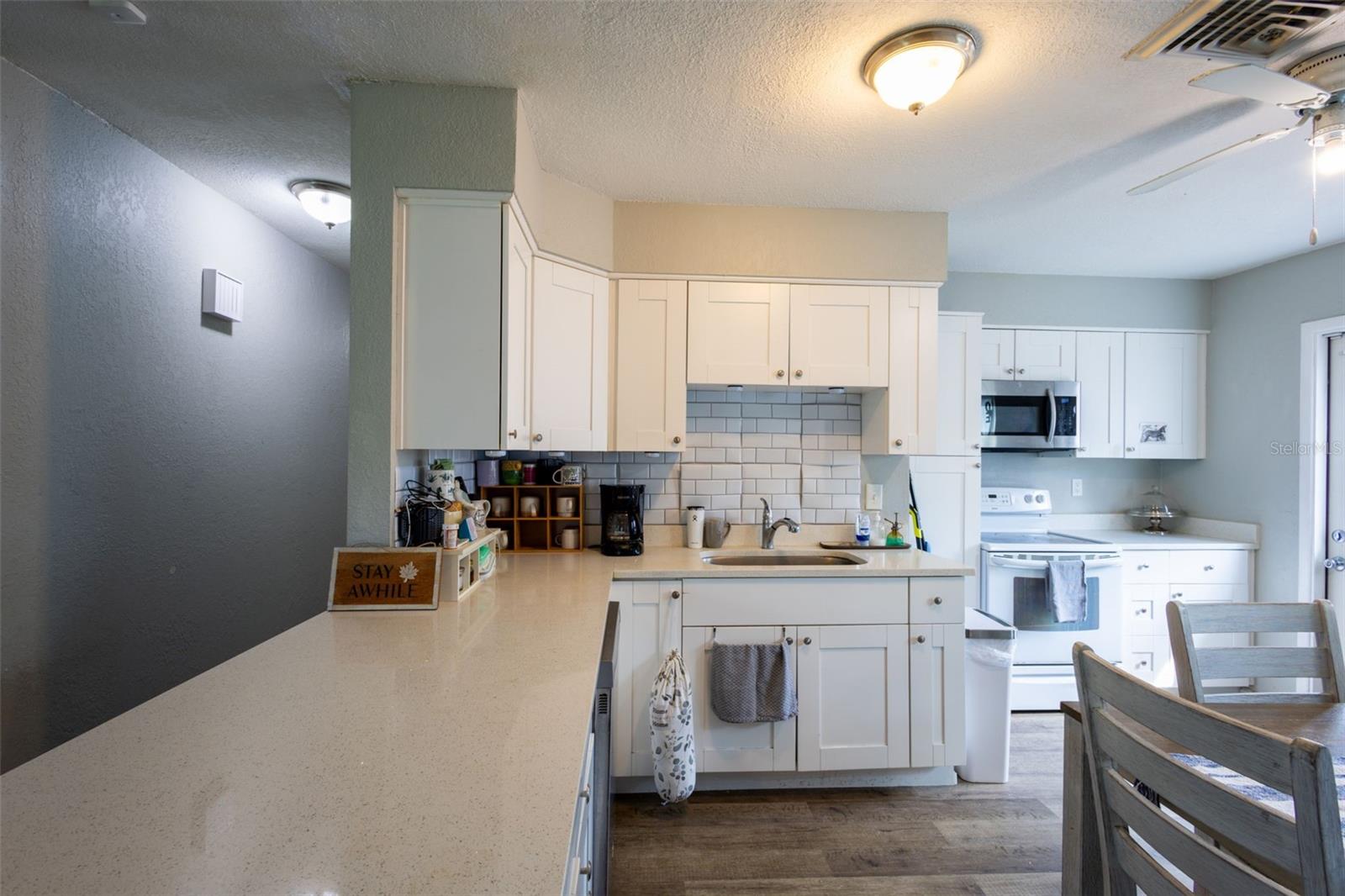 Back splash is stick and peel, needs to be replaced