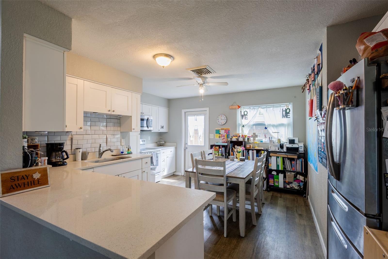 Very nice updated kitchen with quartz countertops