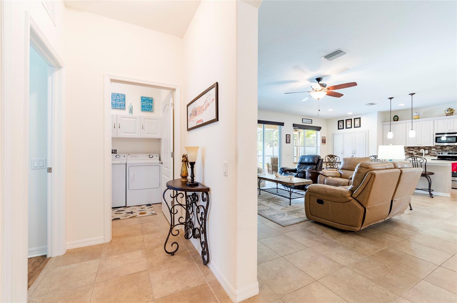 Hall to second bath and two other bedrooms, Laundry room