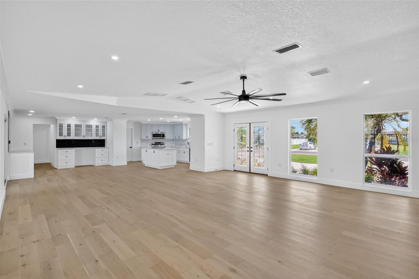 As you enter your new home through the Double entry doors you will be met by the open living space