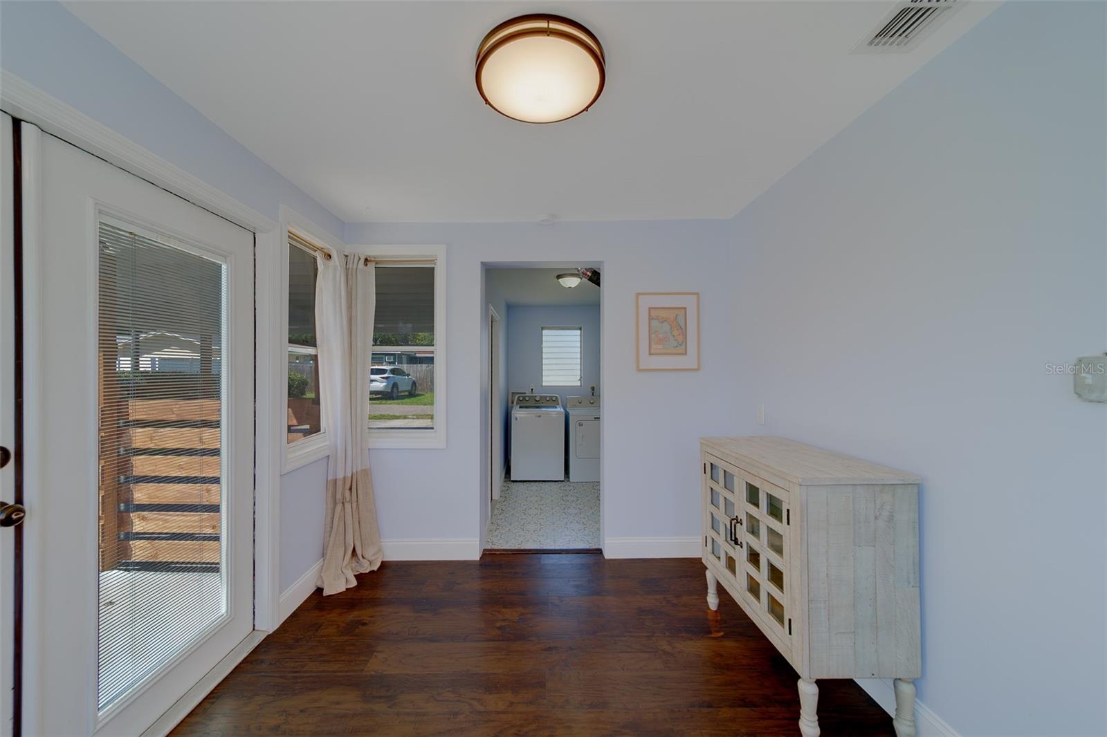 Sunroom leading to inside laundry