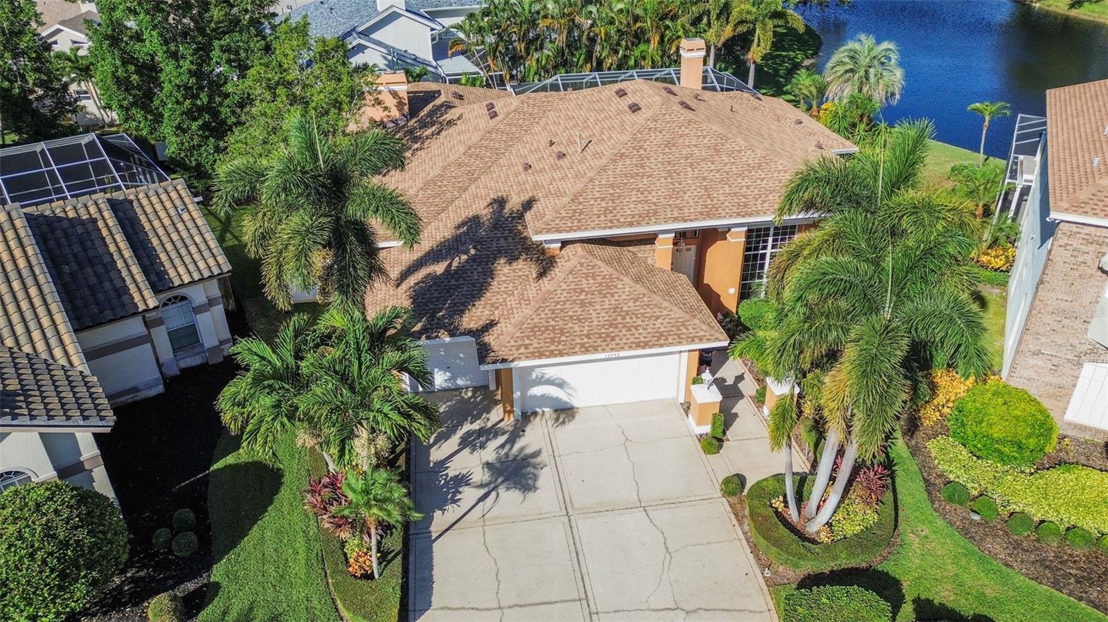 Font view, over looking the lake. The Palms scream Florida!