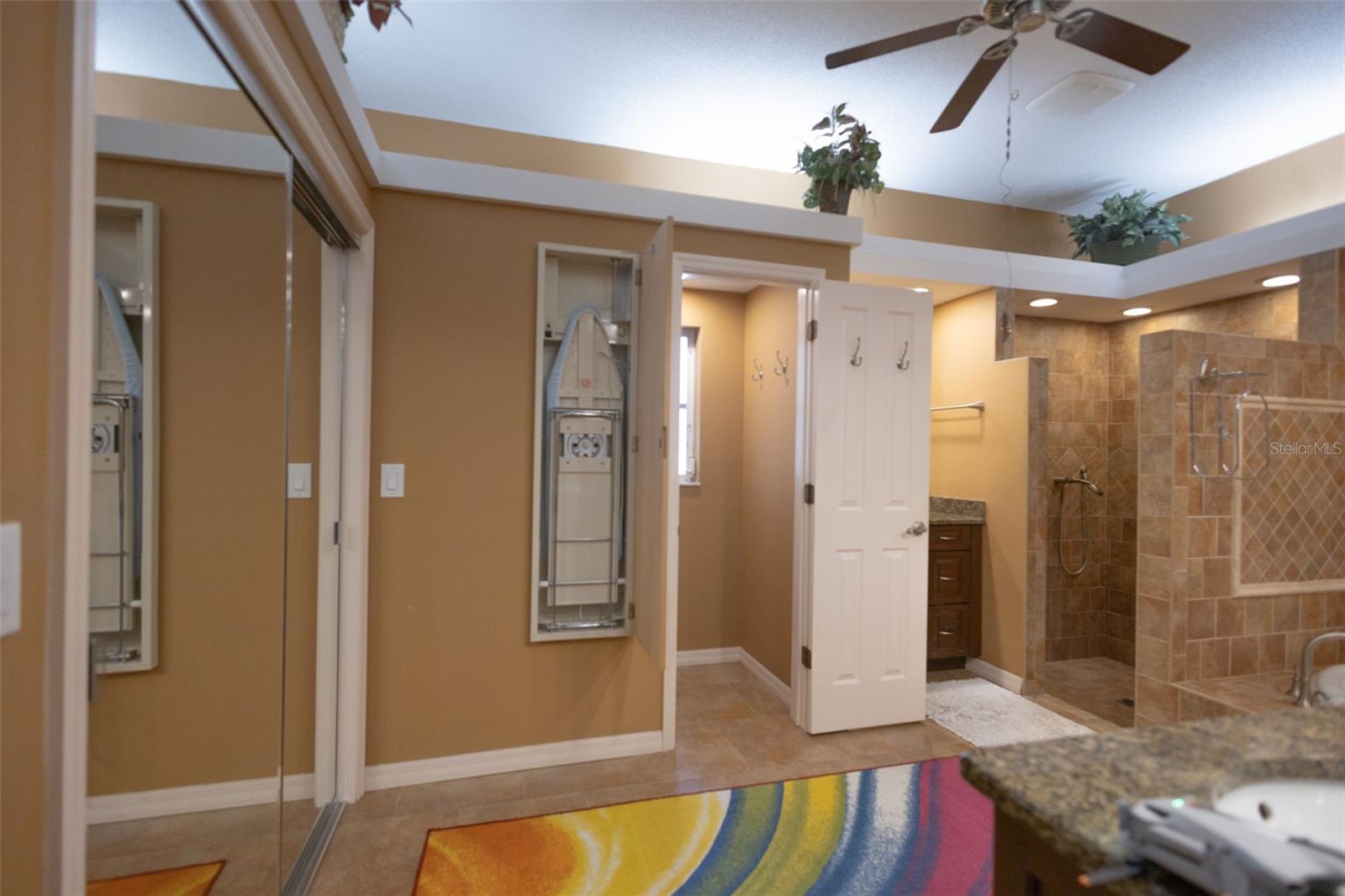 Main Primary on-suite bath, with private toilet, large walk-in shower and a soaker tub, sliding doors on the left lead to a very spacious walk-in closet.