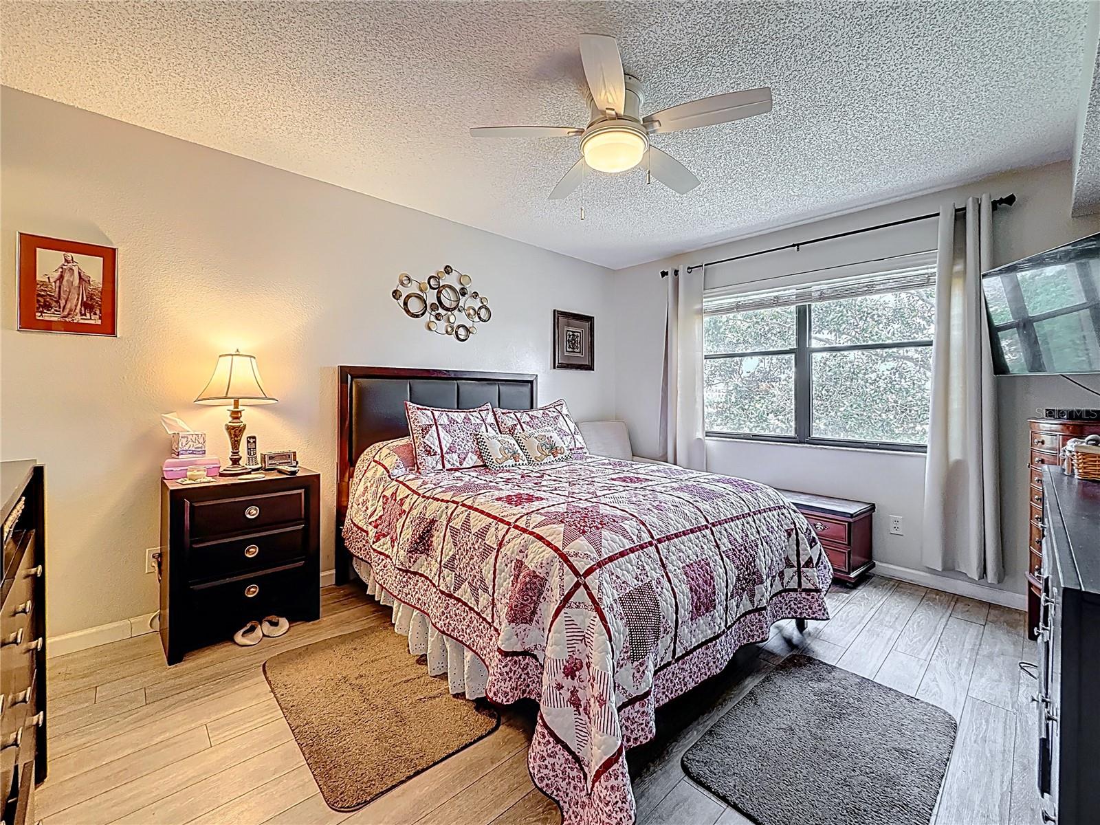 Bedroom views of lake. Plenty of natural light