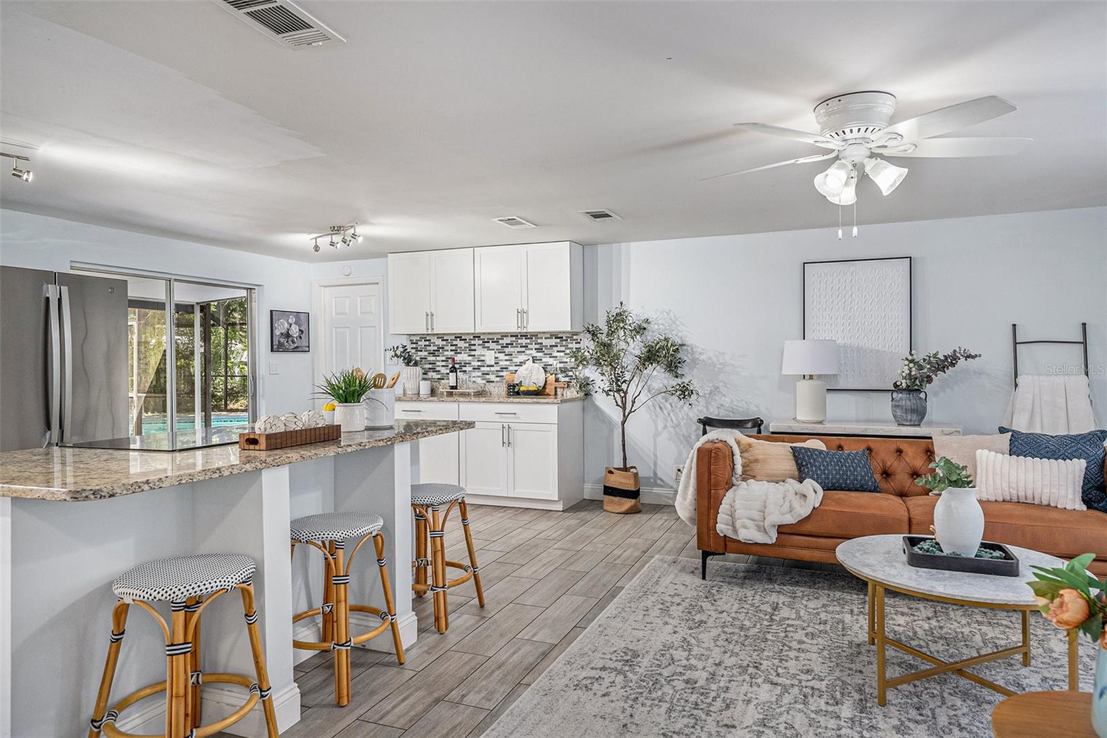 Eat in kitchen bar adjacent to living room