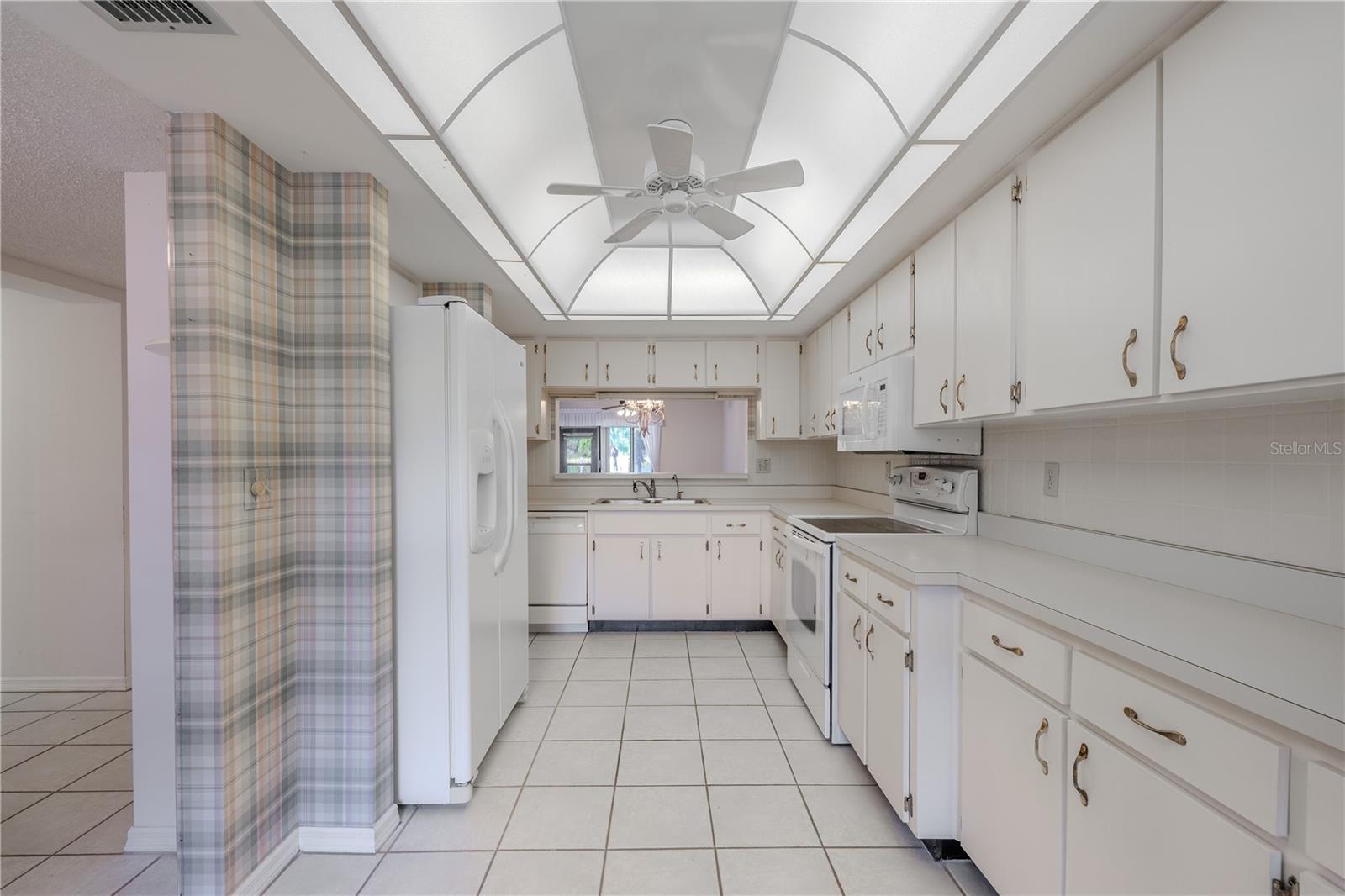 Bright and open, natural light keeps this kitchen feeling airy.