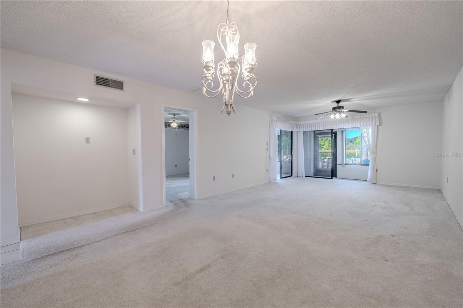 Dining transitions seamlessly into the living area, keeping the layout open and inviting.