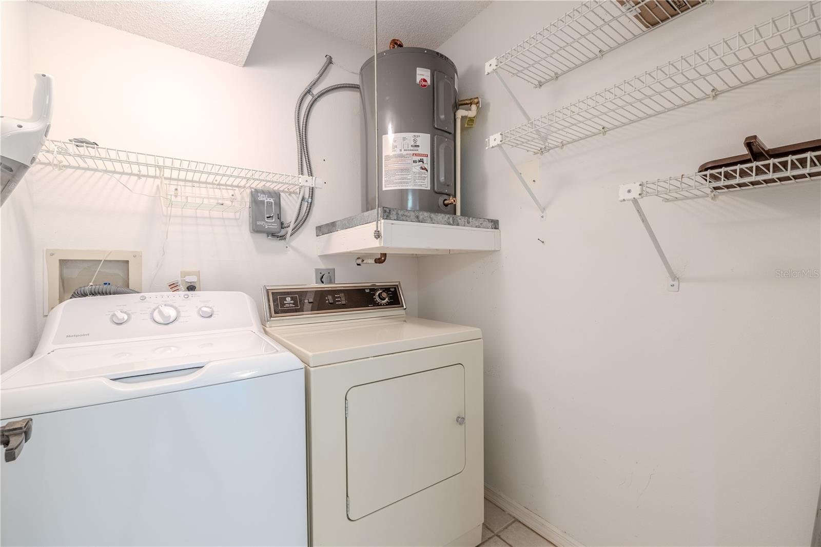 Rather than a shared facility, this villa provides the convenience of your own laundry room right inside the home.