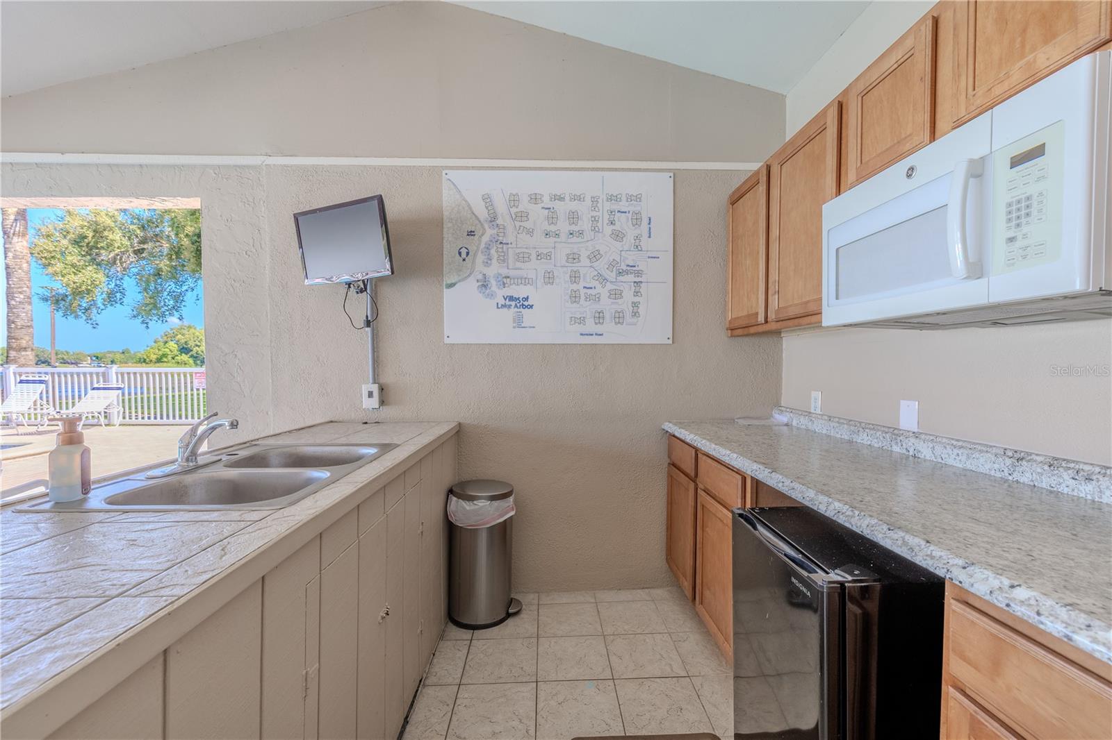 A community gathering space with kitchen access makes entertaining easy and social events more enjoyable.