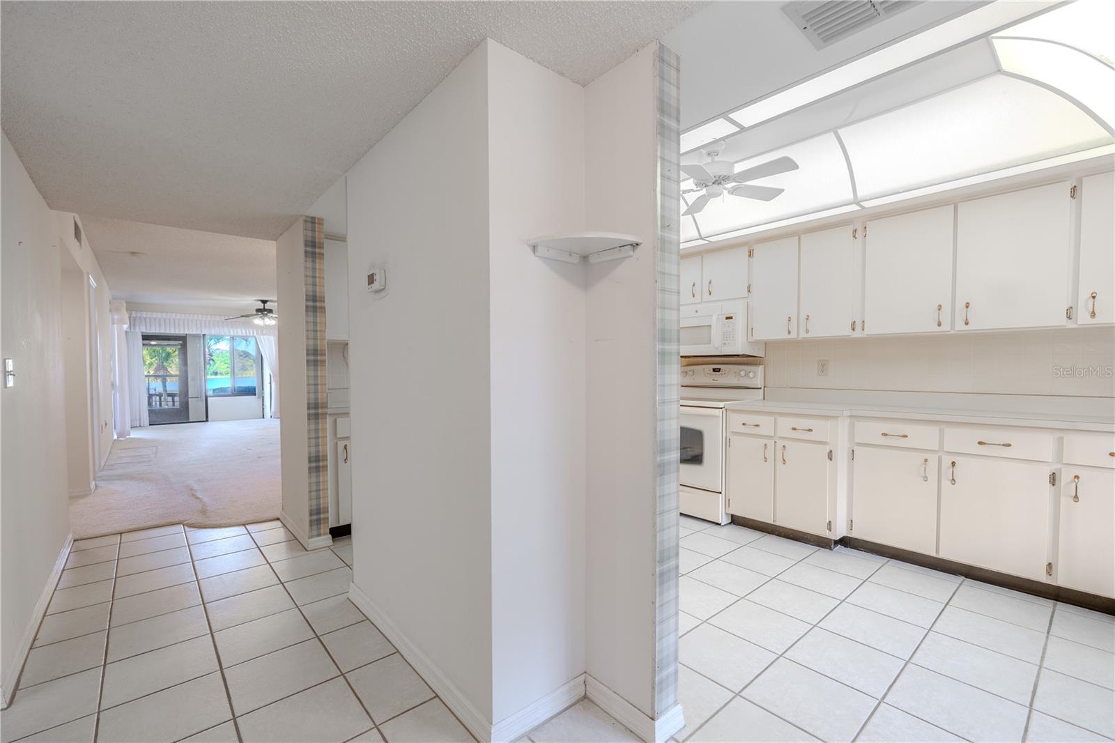 Light flows easily from kitchen to dining, giving you a connected space for everyday living.