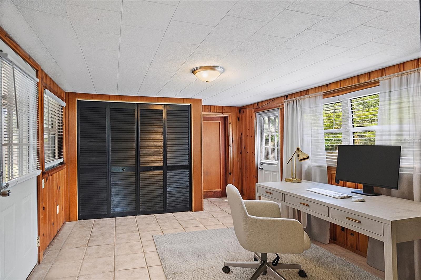 Cozy home office option - Virtually Stage image, some structural details may have been unintentionally altered.