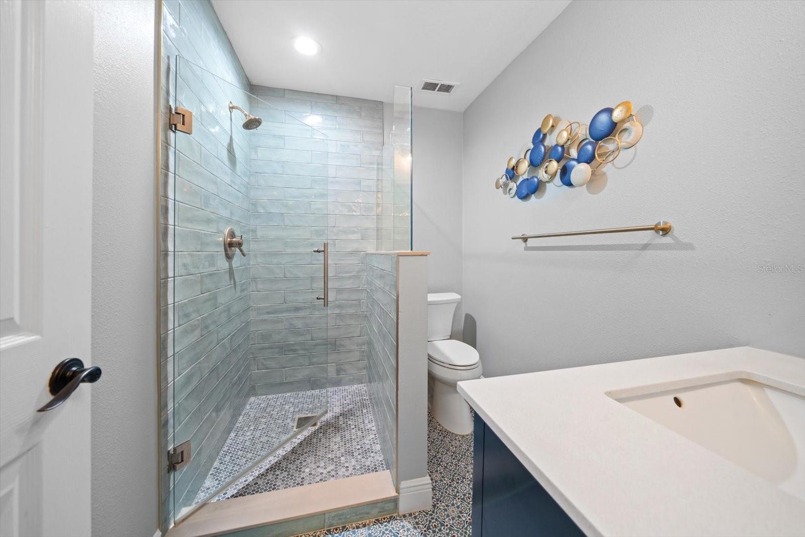 Full bath with step in shower on 3rd level