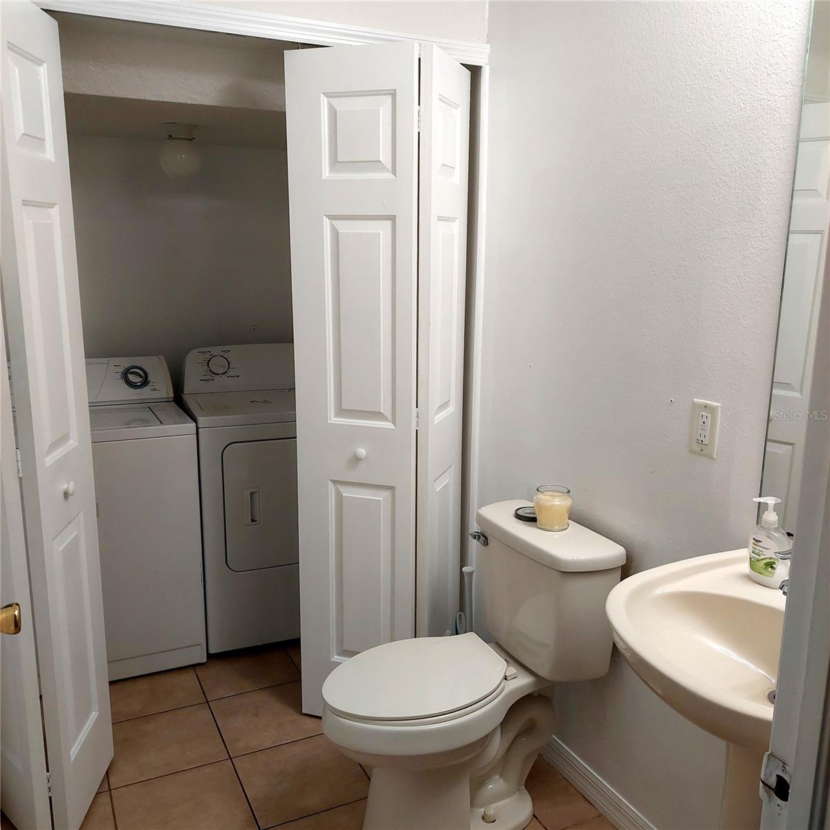 downstairs half bath & utility area