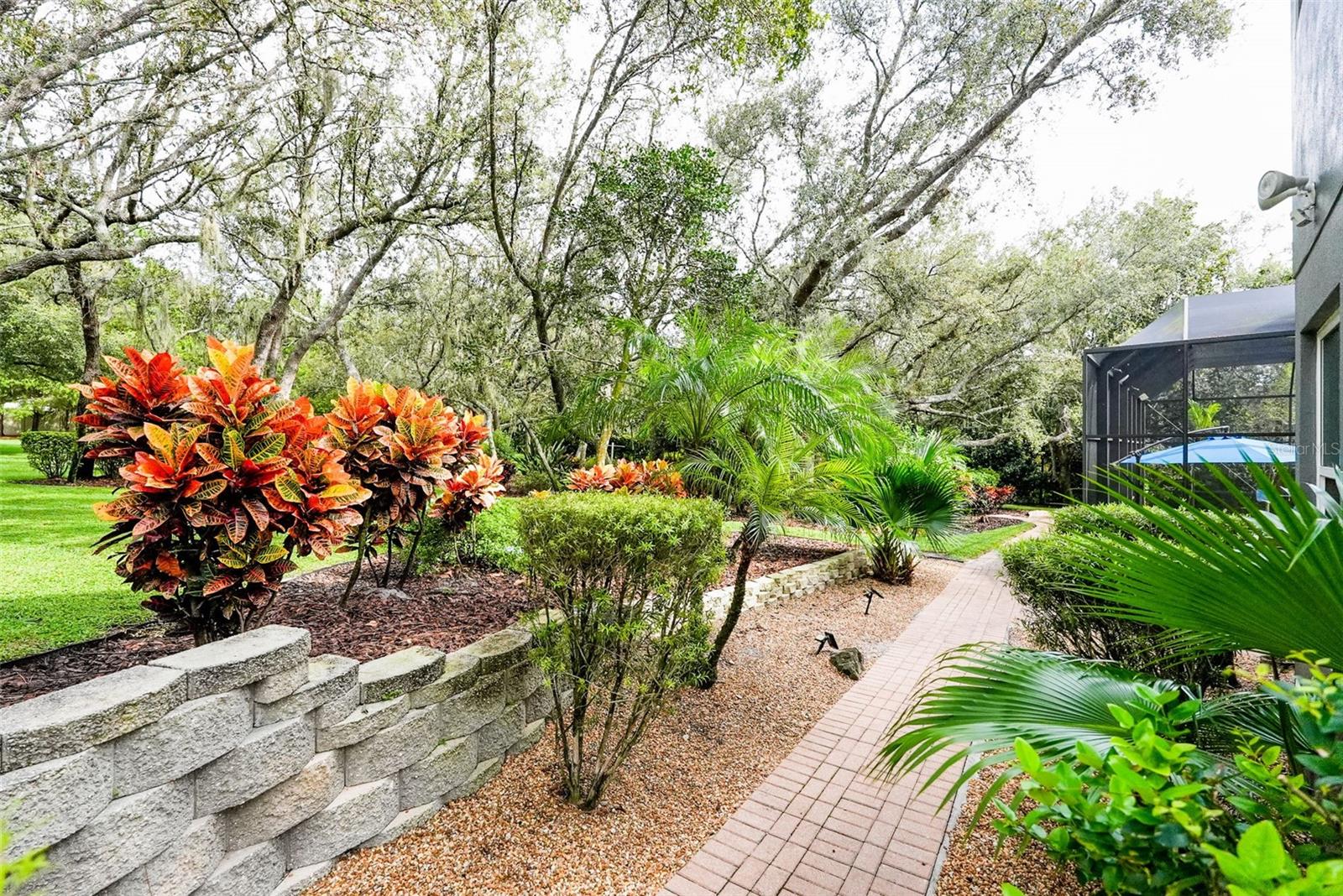 walkway from garage around home to pool & fireplace