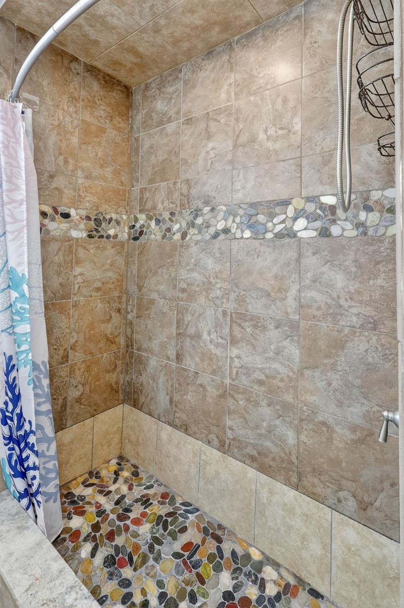 Walk in tiled shower
