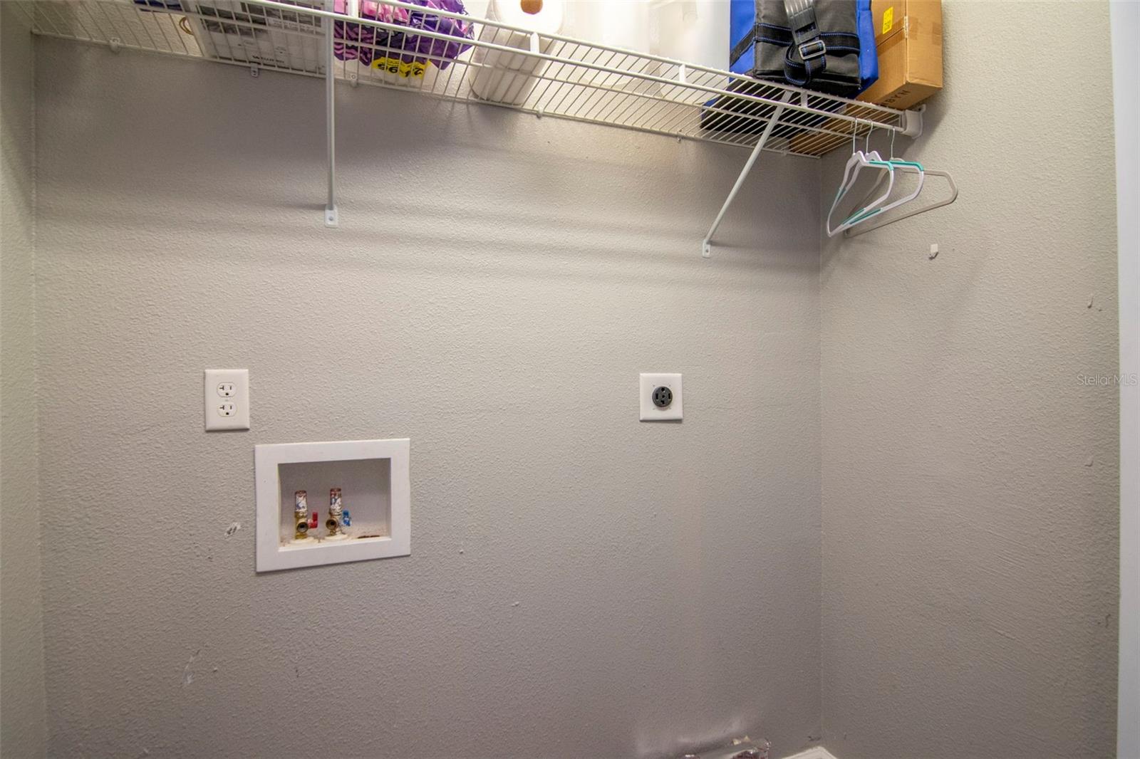 Laundry closet - in between kitchen & 4th bedroom.
