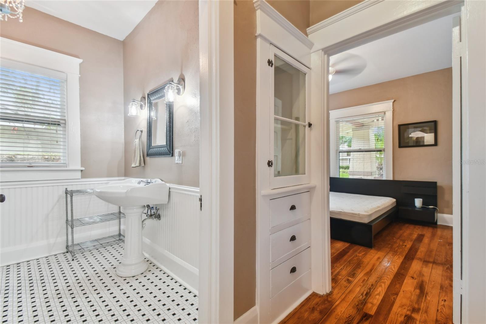 Guest bath convenient to guest bedroom. Oh, and check out the cool built-in cabinet