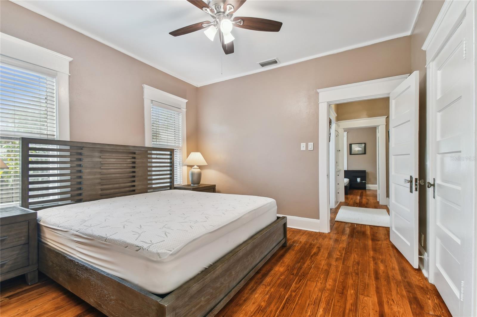 Spacious primary bedroom has plenty of room for that king bed